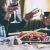 Couple sharing a meal over wine